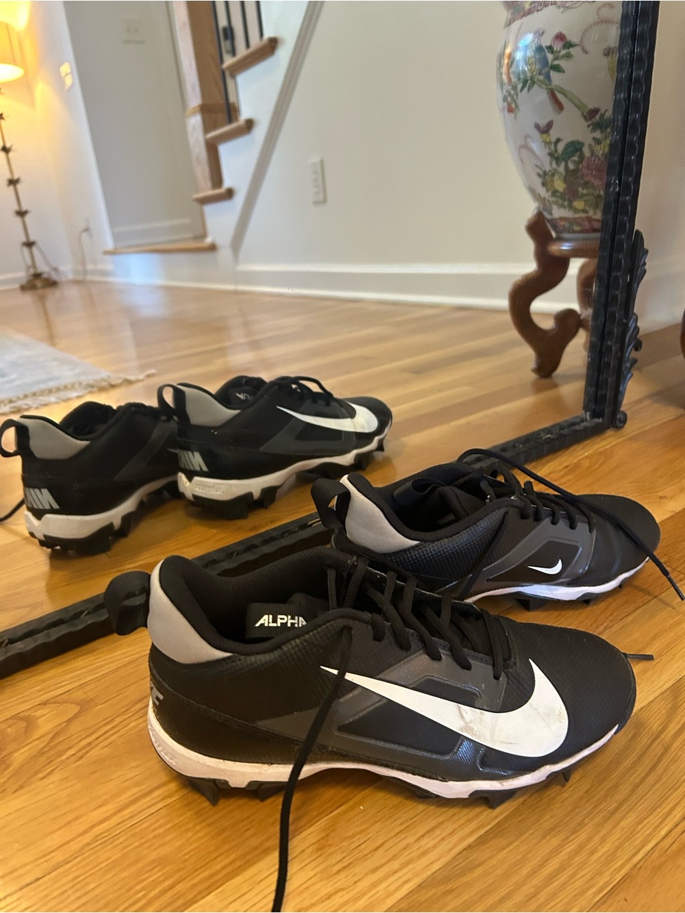 Nike Black and White Alpha Womens’ Athletic Cleats